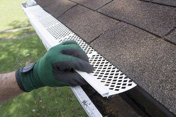 gutter guards can help prevent pests from nesting in your gutters by blocking access to the enclosed space